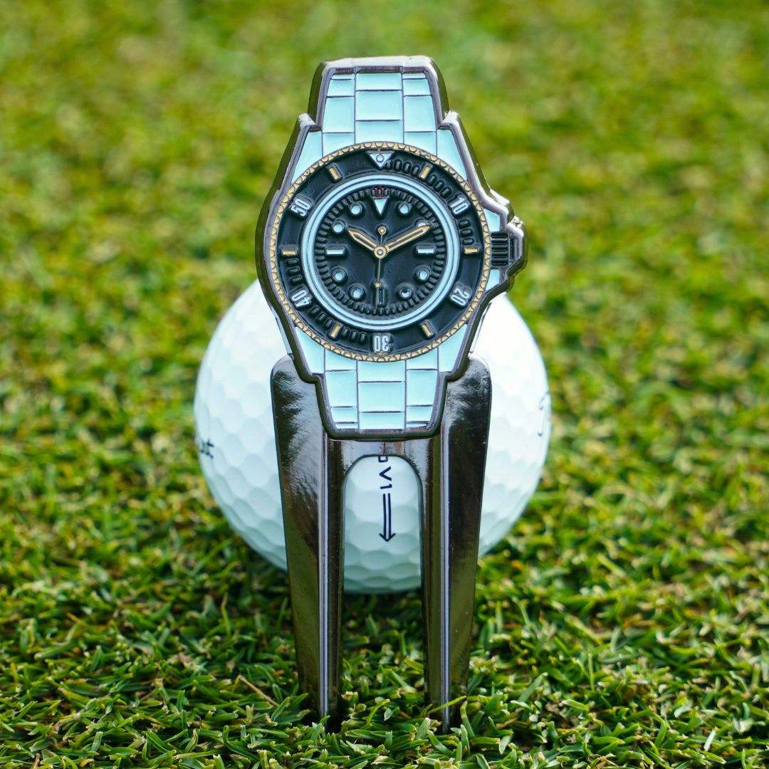 Pitch mark repairer with cool watch details