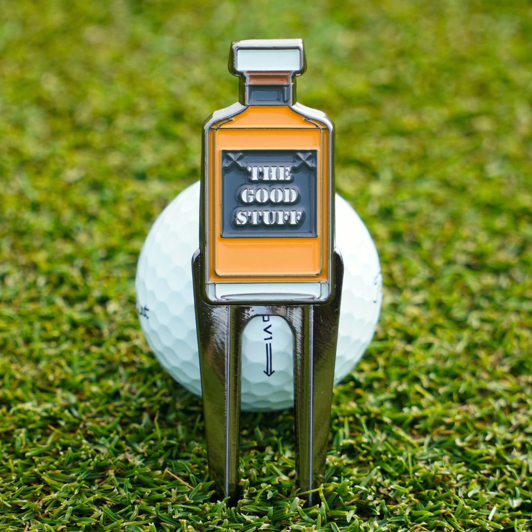 cool pitch mark repairer with bottle of whiskey design